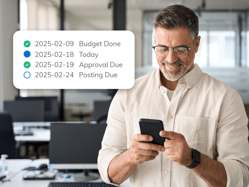 A man looking at his smart phone seeing the status of a budget
